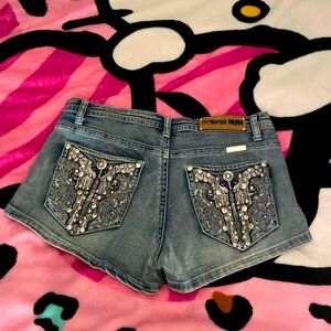 Cute rhinestone jeans that are light blue denim